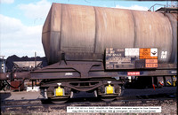 33 87 7797 021-5 = SNCF 1004283 GE Rail Caustic soda tank wagon @ Immingham 2003-10-18 � Paul Bartlett [4w]