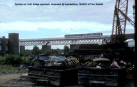 Sprinter on Forth Bridge approach, scrapyard @ Inverkeithing 91-08-16 � Paul Bartlett w