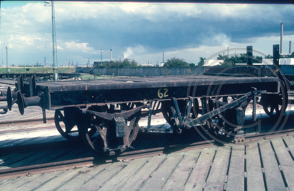 62 Unidentified flat wagon steel frame independent brake @ Empire Paper Mills, Greenhithe, Kent 85-08-03 © Paul Bartlett