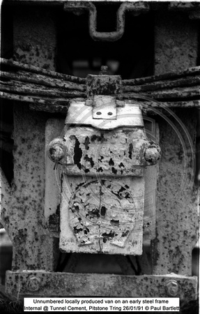 Grease axlebox Unnumbered locally produced van on an early steel frame Internal @ Tunnel Cement, Pitstone Tring 91-01-26 © Paul Bartlett [2w]