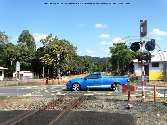 Level crossing at Cairns of Kurunda Scenic Railway, Queensland 06-10-2014 � Paul Bartlett DSC07306